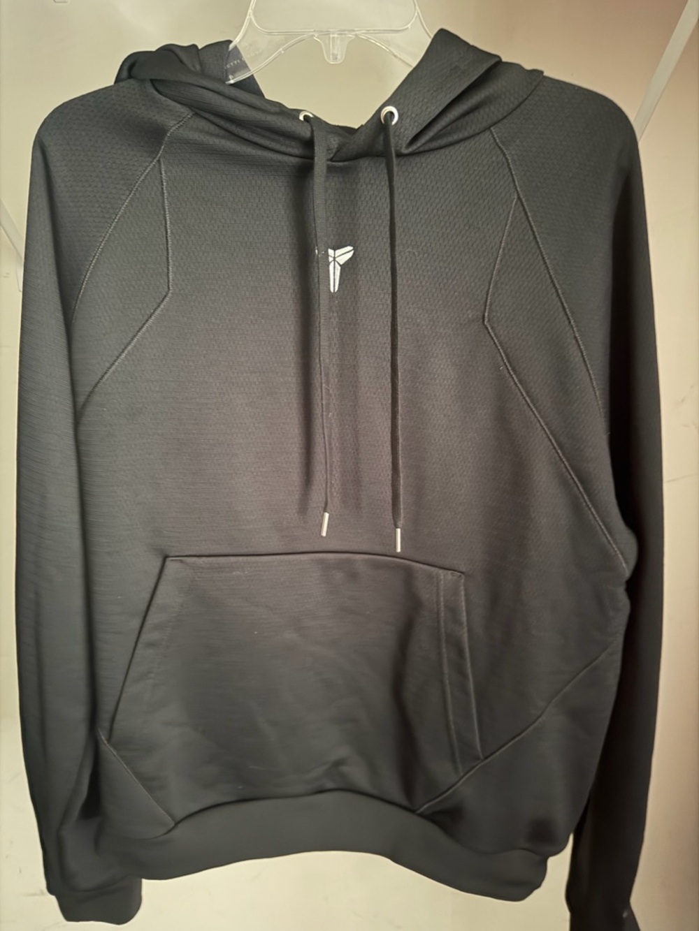 Men's Black Performance Pullover Hoodie with Subtle Crest